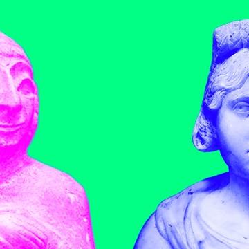 Two old statues re-coloured in bright pink and blue against a green backdrop